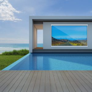 Aquavision Horizon outdoor TV hanging in an alcove beside a pool
