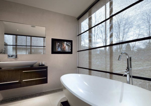 Aquavision TV with classic frame on wall of a bathroom