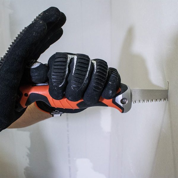 KLEIN TOOLS Folding Jab Saw / Pad Saw being used to cut into a wall