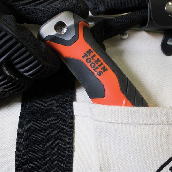 KLEIN TOOLS Folding Jab Saw / Pad Saw - shown in a tool pouch - only handle visible