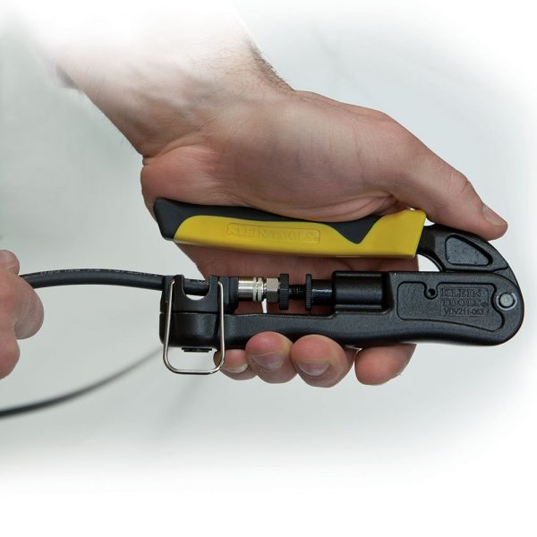 KLEIN TOOLS Heavy-Duty Multi-Connector Compression Crimper - showing someone using the crimper tool