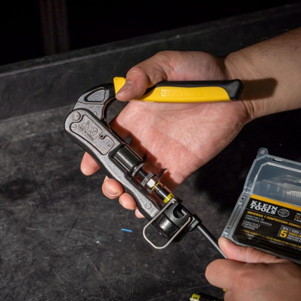 KLEIN TOOLS Heavy-Duty Multi-Connector Compression Crimper - showing someone using the crimper with the tool open about to crimp