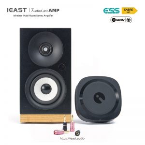iEAST AMP80 iEAST multiroom streaming amplifier - promo image of unit next to a speaker